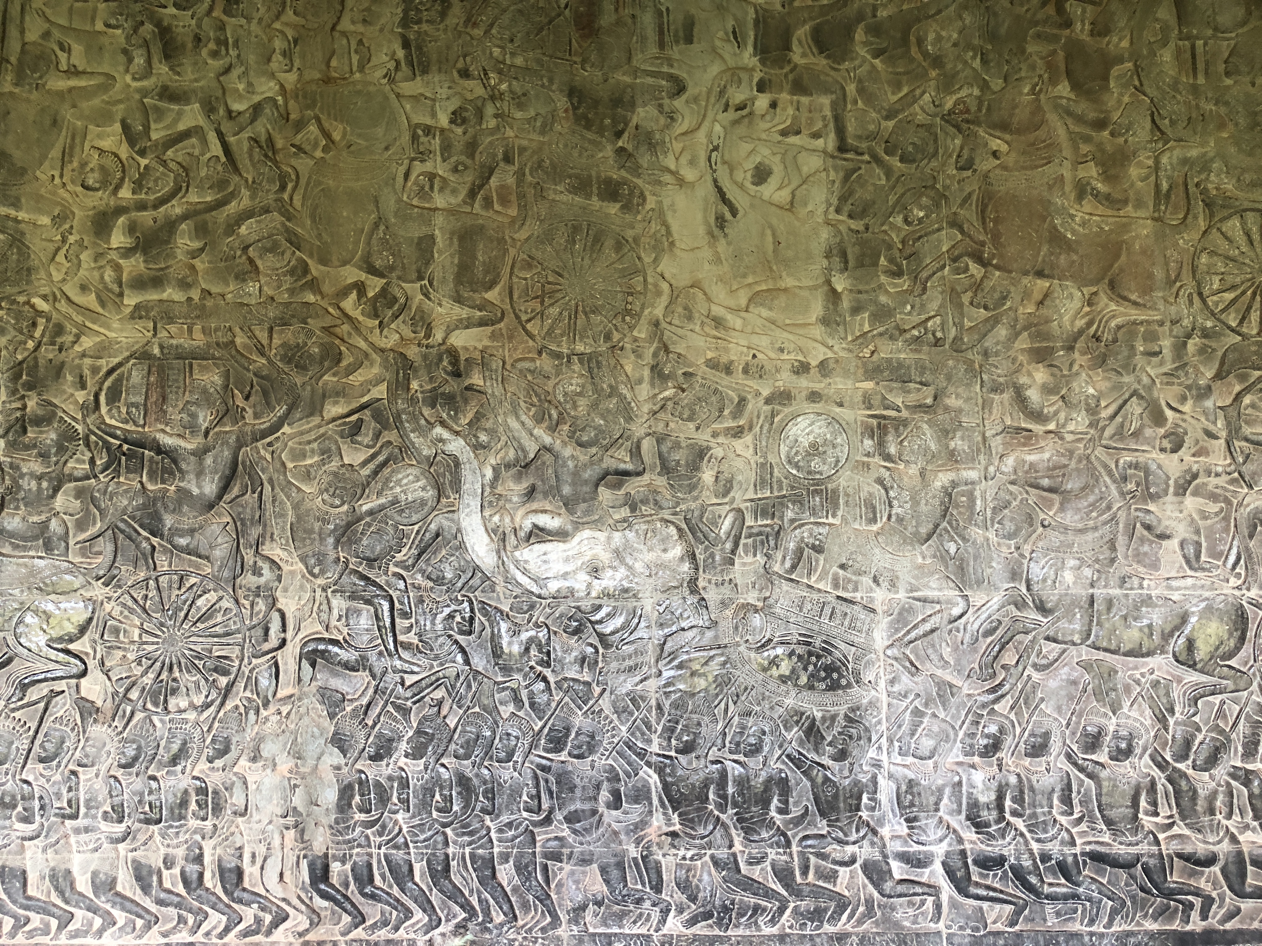 carvings in angkor wat ruins