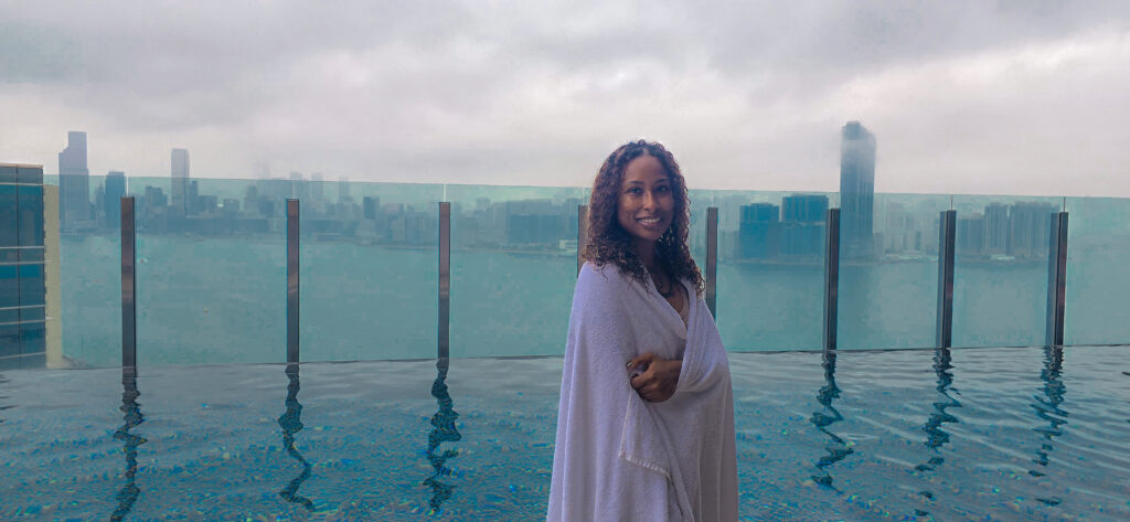 swimming at infinity pool at hyatt centric victoria harbour hong kong