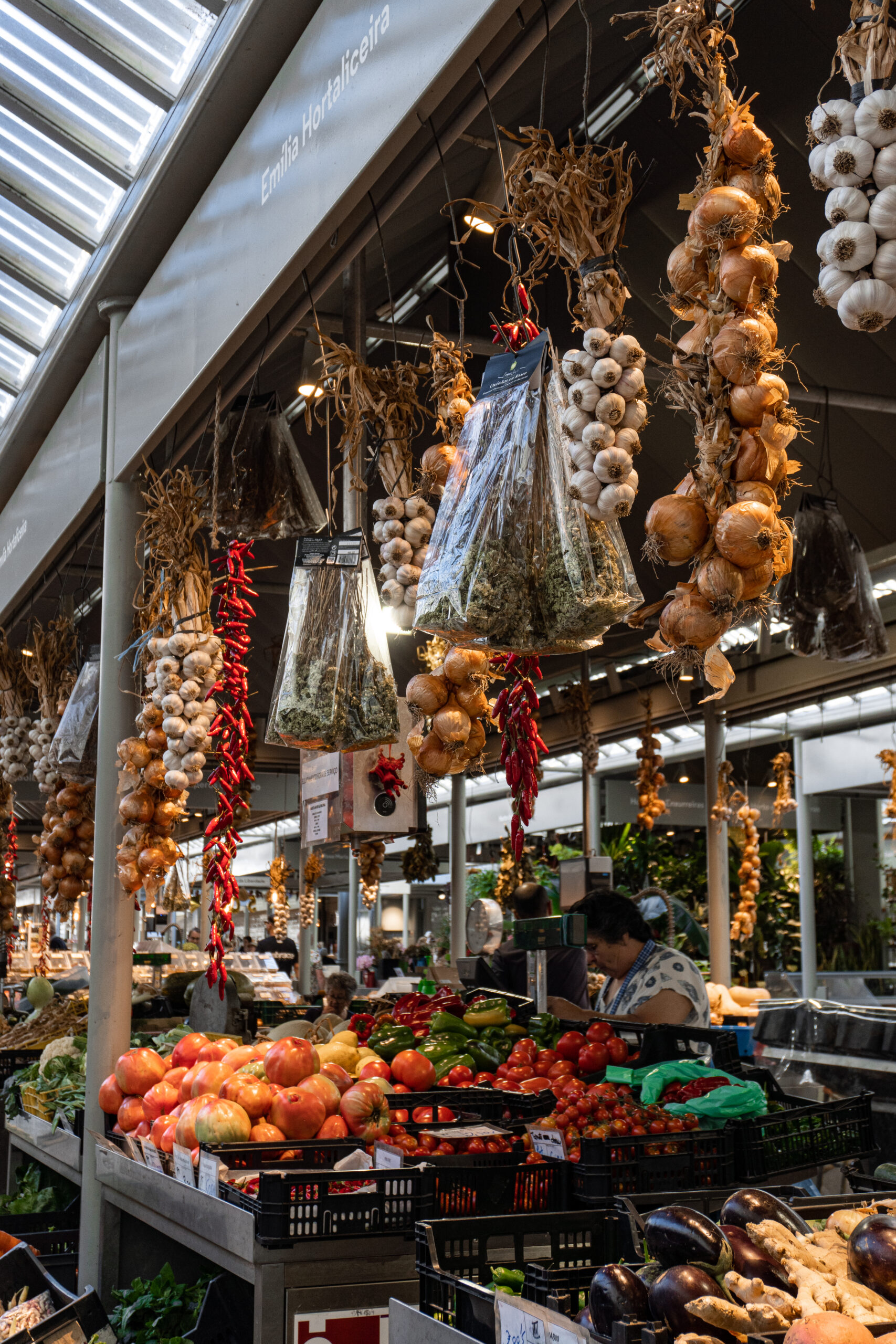 fresh herbs hanging at mercado bolhão things to do in porto