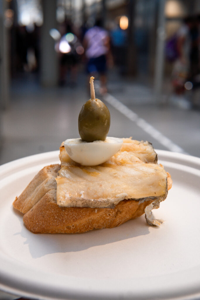 fish pastry snack at mercado bolhão things to do in porto