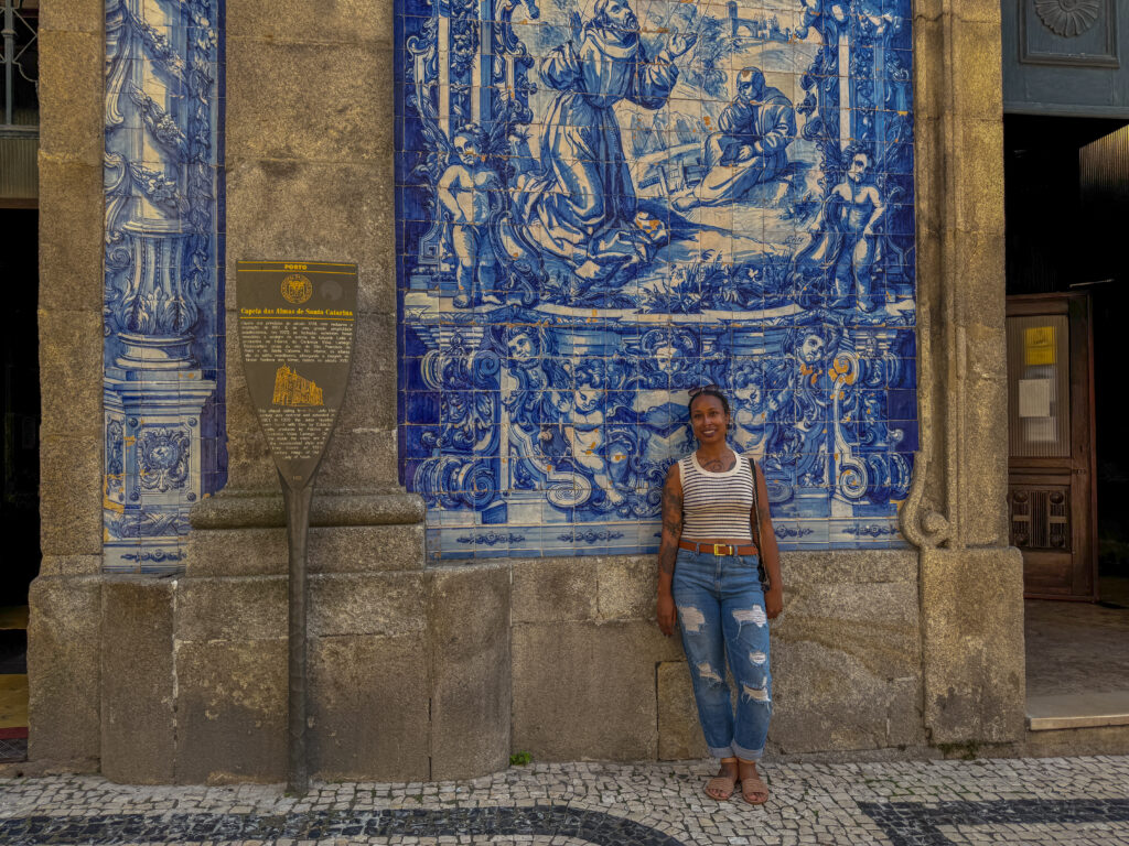 Blue and white azulejo tiles covering the Chapel of Souls on Rua de Santa Catarina in Porto Portugal