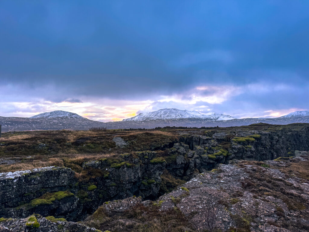 Snow-covered landscape of Þingvellir National Park, the historic site of the first Icelandic parliament.