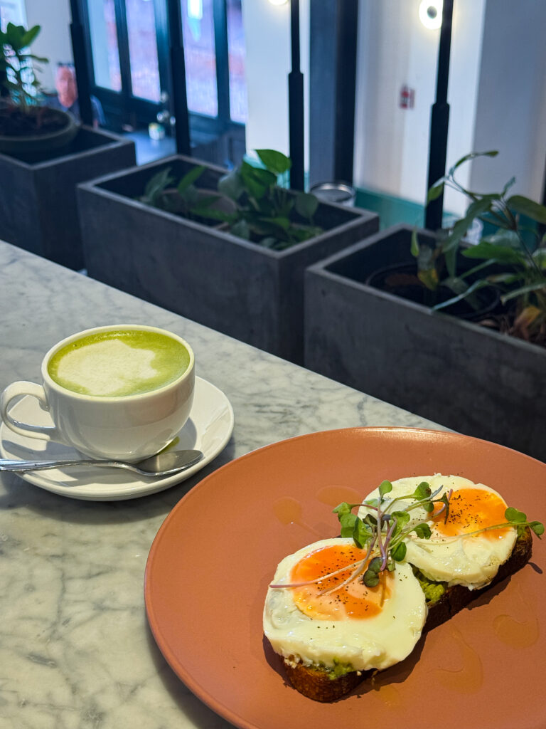 matcha latte and brunch plate at Café Unido in Casco Viejo